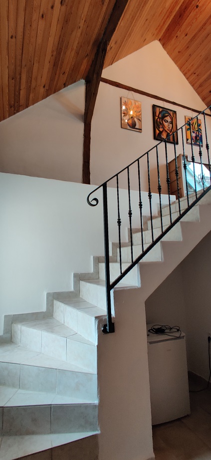 Schodiště vedoucí do podkroví